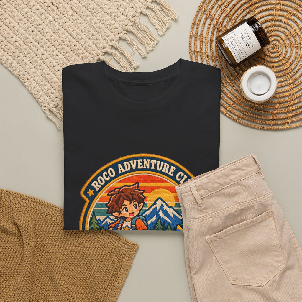 Explore Carosia tee in black, folded – Explore Carosia Badge design, official Roco Kingdom merch