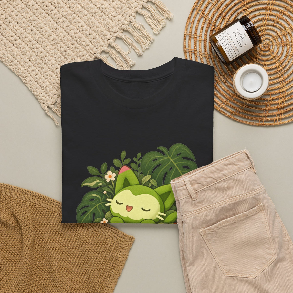 Team Meevy shirt in black, folded – Meevy Grow at Your Own Pace design, official Roco Kingdom merch