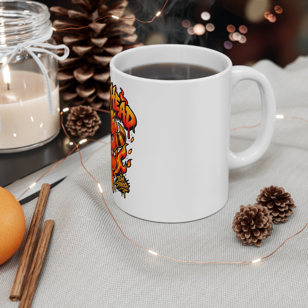 Team Sparka mug, on a desk – Hot Head design, official Roco Kingdom merch