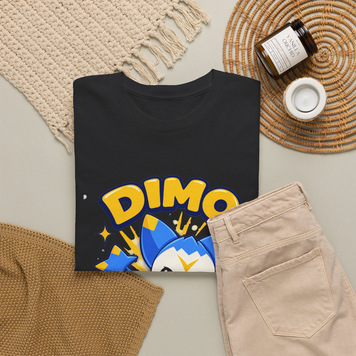 Dimo shirt in black, folded – Dimo Light Burst design, official Roco Kingdom merch