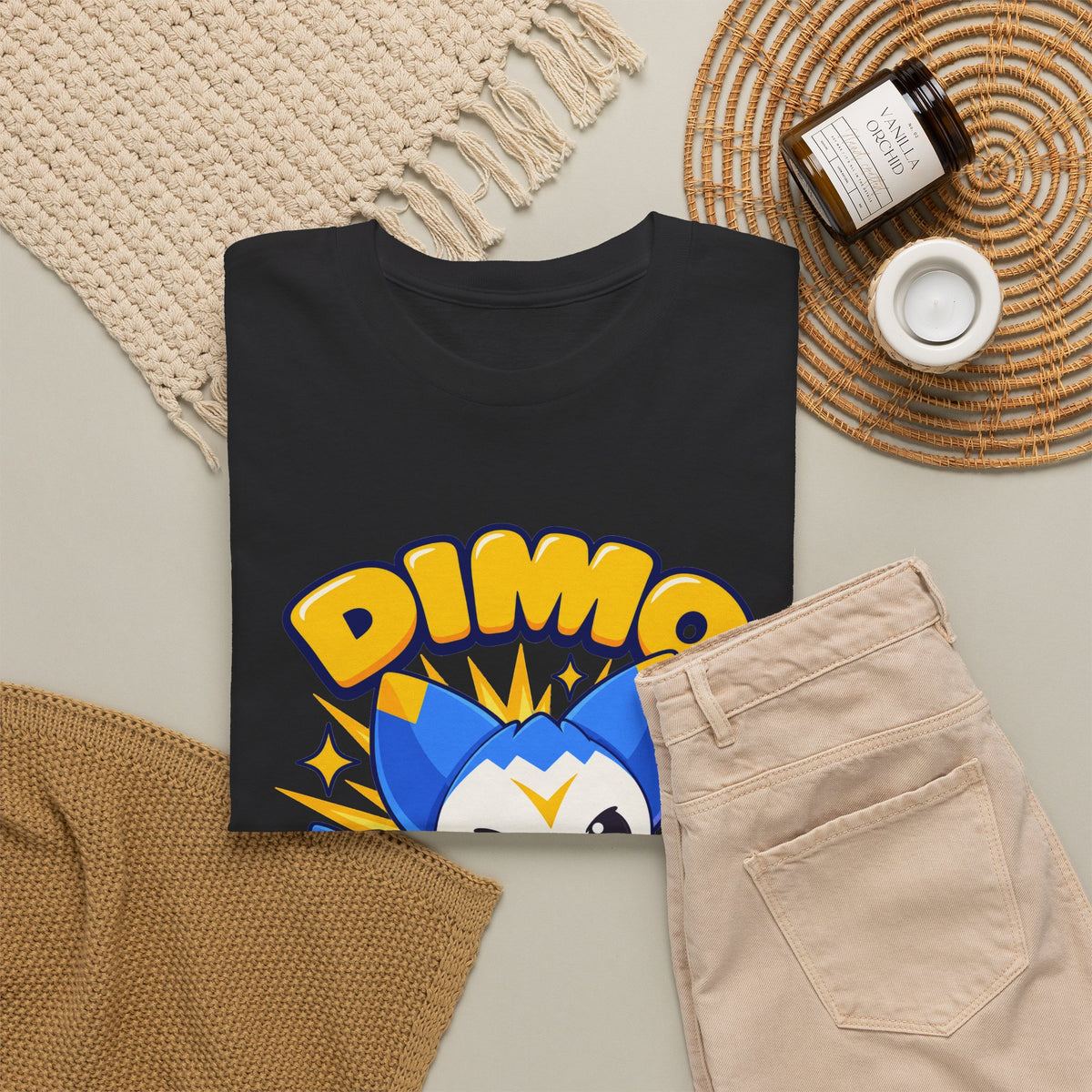 Dimo t-shirt in black, folded – Dimo Jini of Light design, official Roco Kingdom merch